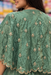Close-up back motif work and scalloped trim