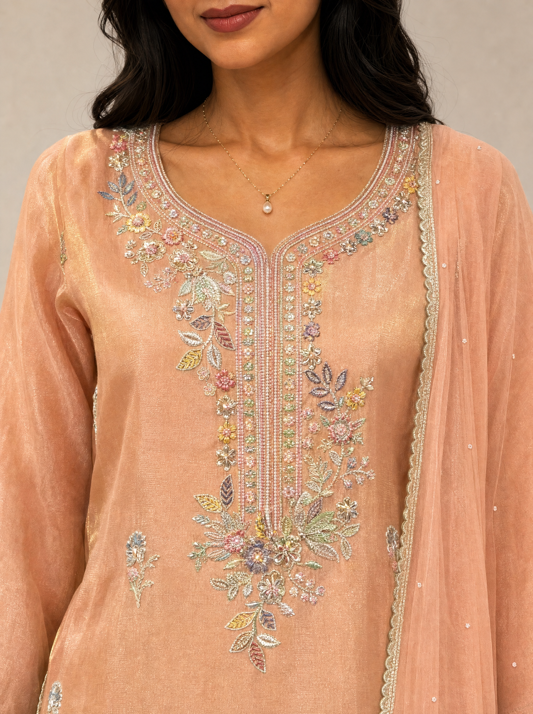 Anmol peach embroidered palazzo salwar set — neck work detail